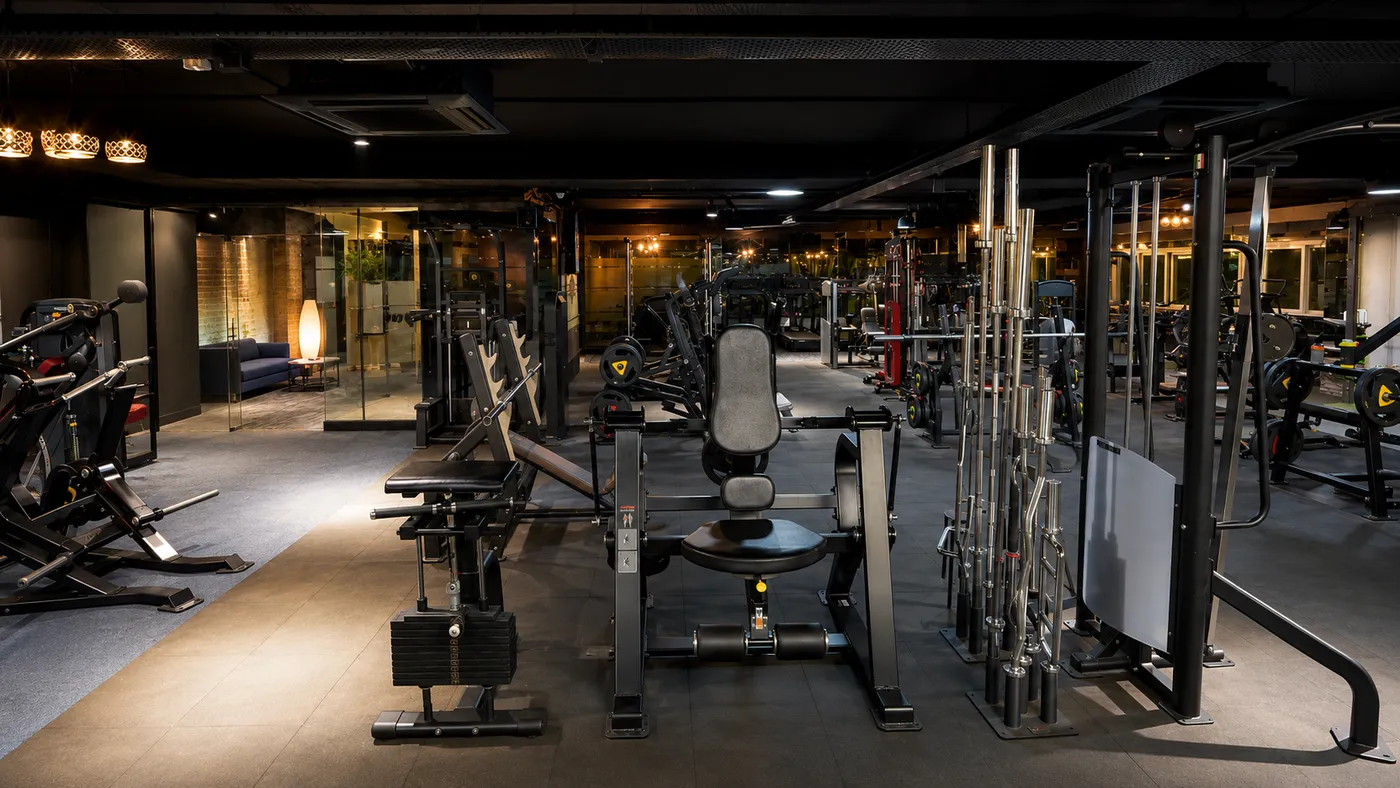 The free-weight and barbell platform zone at V2 Fitness Zone Sainikpuri